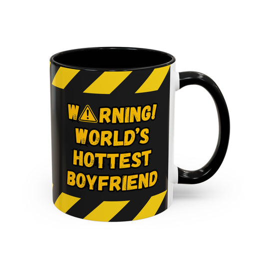 Black mug with yellow warning text on a white background
