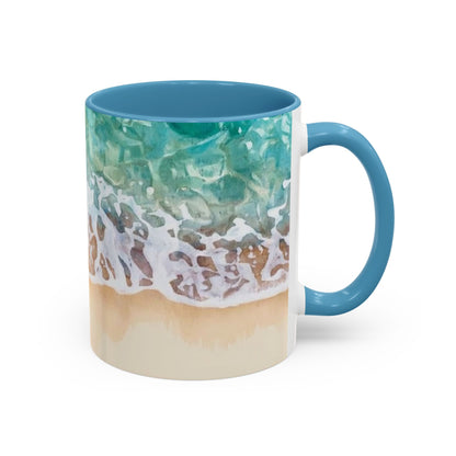 Mug with beach design featuring waves and sand on a white background