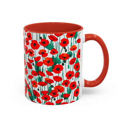 A red mug with red poppy pattern on a white background.
