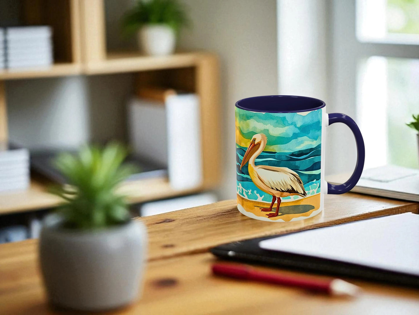 Colorful mug with a pelican design on a wooden desk