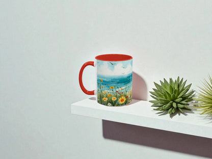 Mug with a scenic design on a white surface with a plant