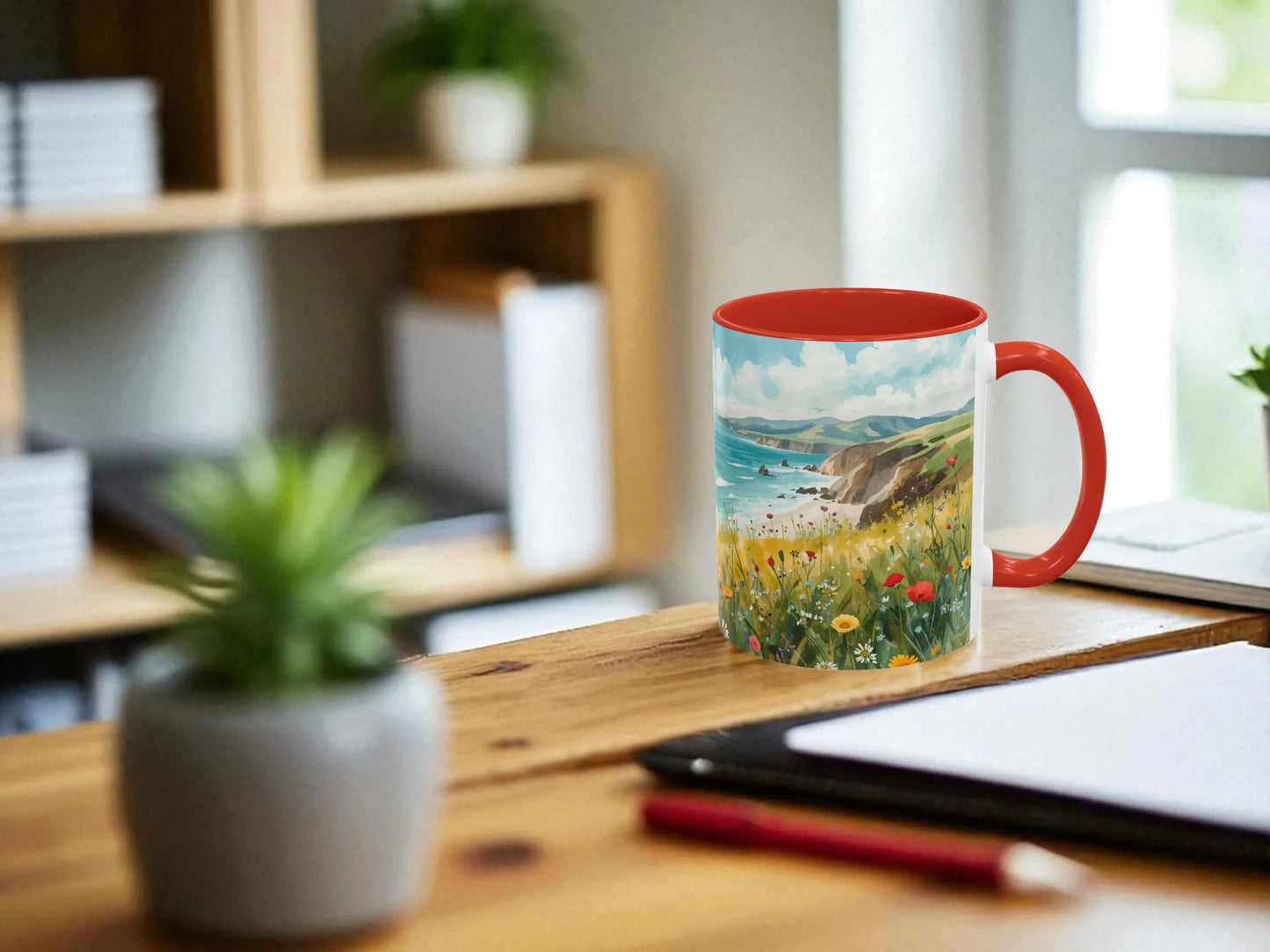 Mug with scenic design on a desk with office items