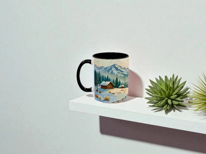 Mug with a scenic design of a mountain landscape on a white surface with a plant.