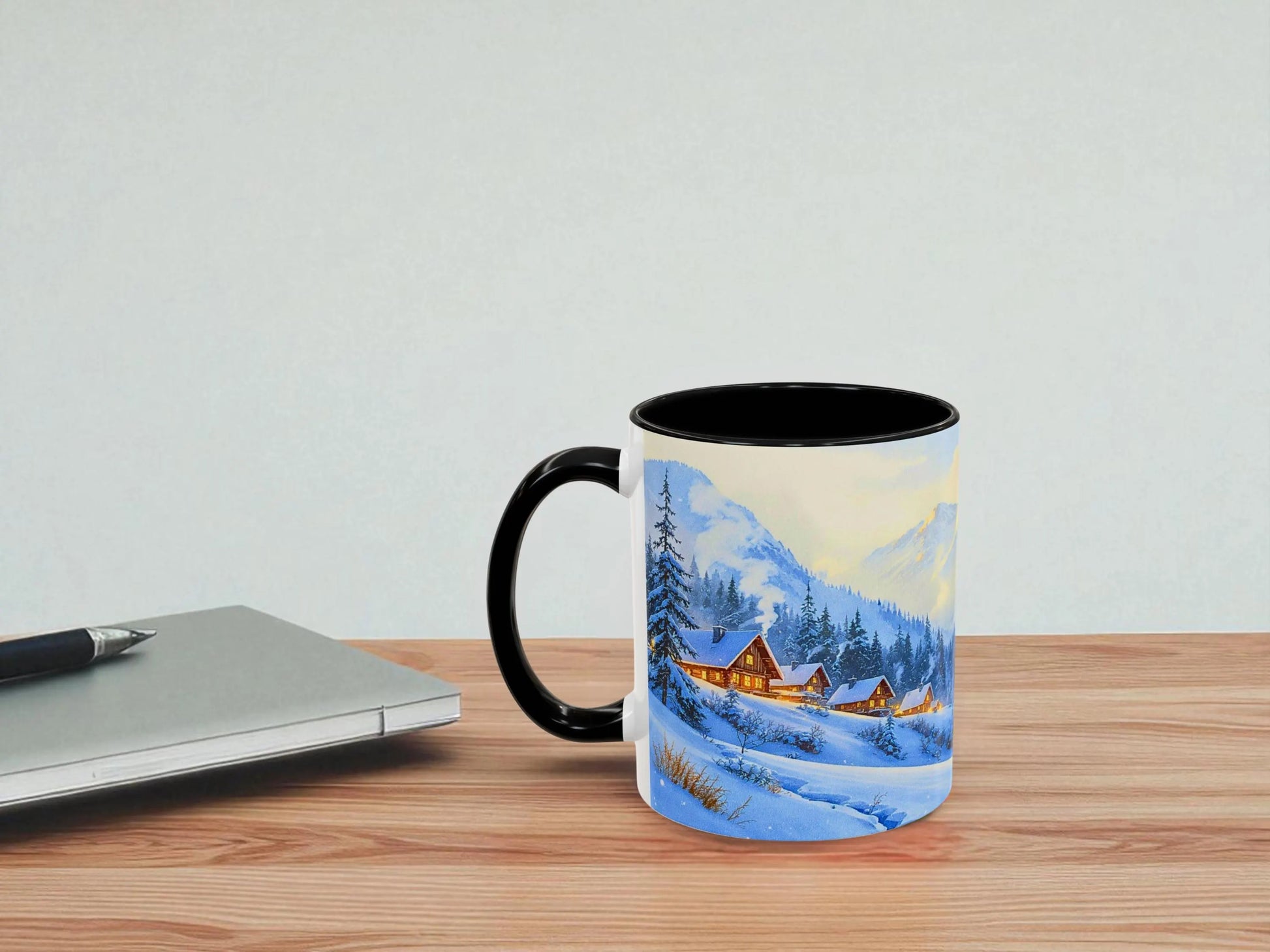 Mug with a winter landscape design on a wooden table with a light gray background