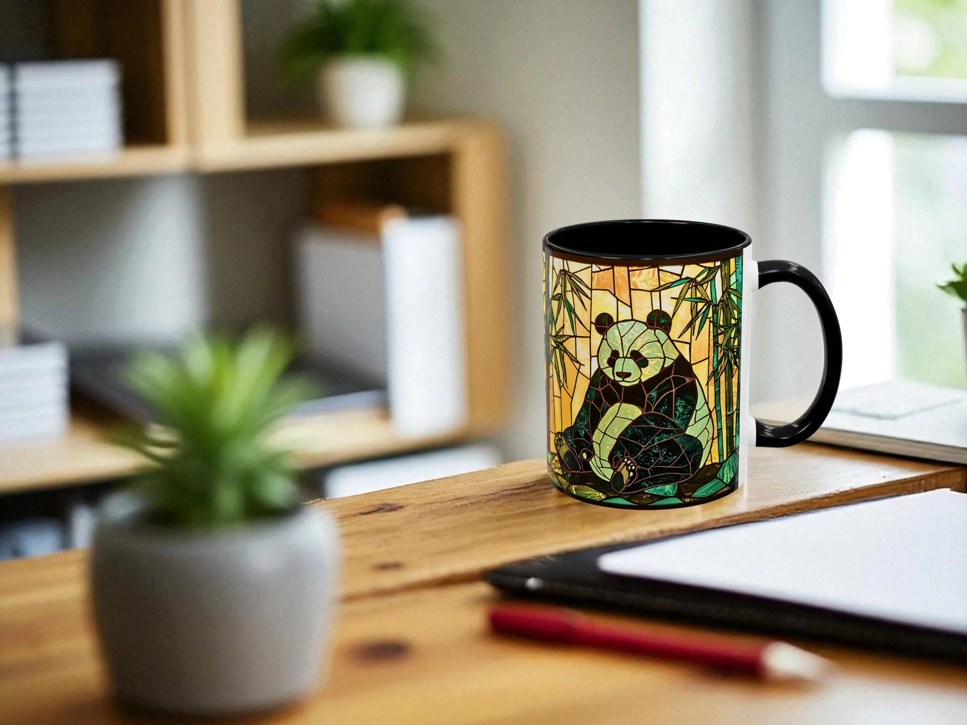 Decorative panda mug on a desk with a blurred background