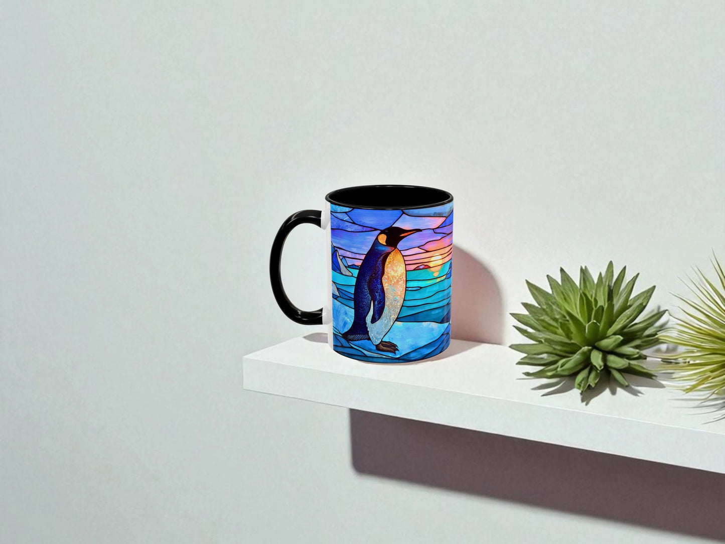 Mug with penguin design on a white surface with plants