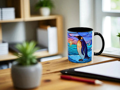 Colorful mug with a penguin design on a wooden desk