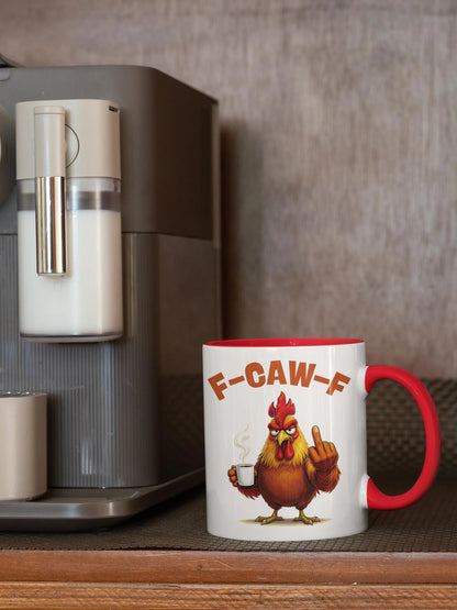 Mug with a cartoon rooster and 'F-CAW-F' text next to a coffee machine.