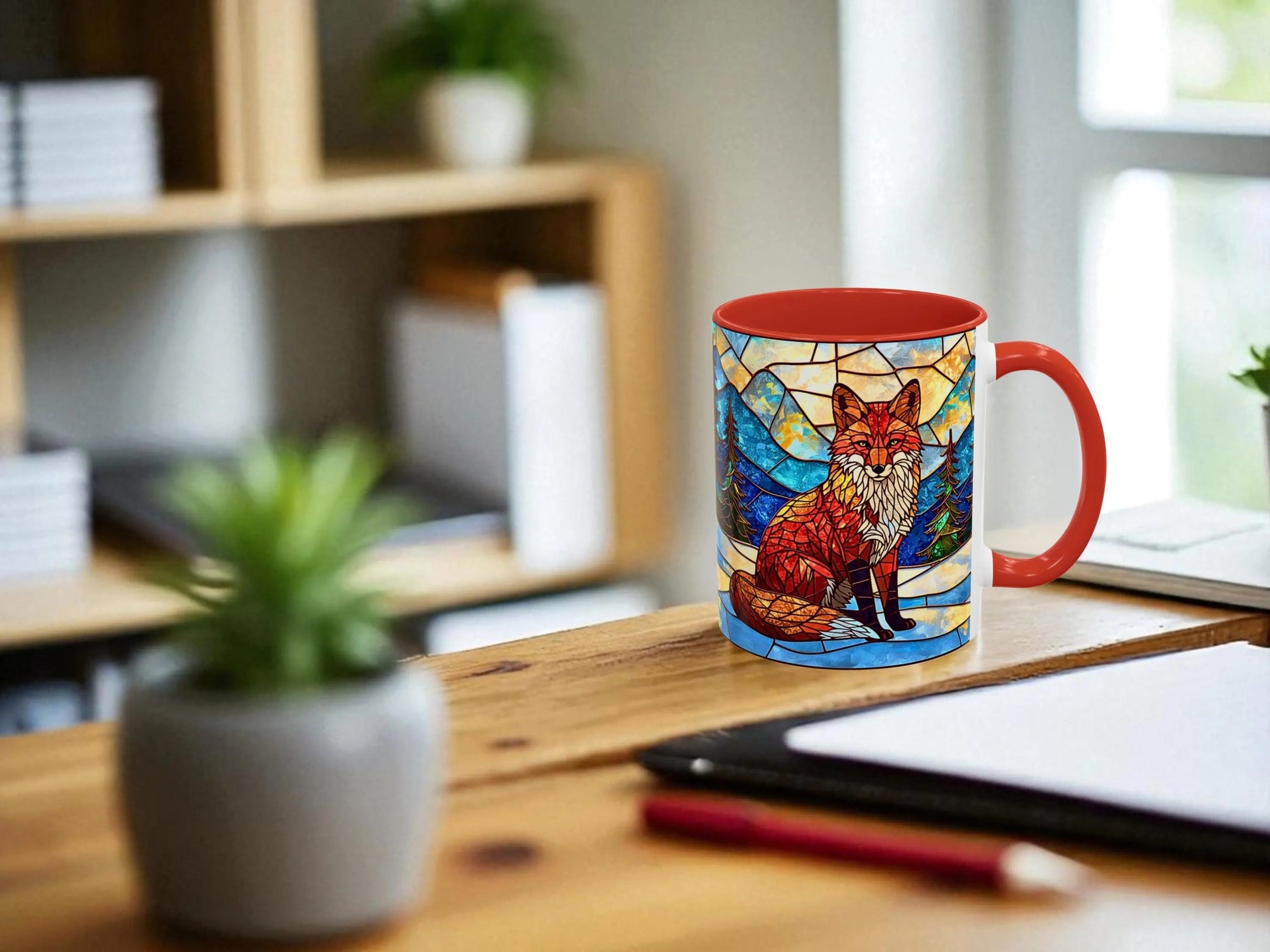 Colorful mug with a fox design on a wooden desk