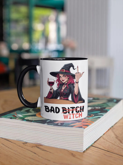 Mug with a graphic of a witch holding a glass of wine and the text 'Bad Bitch Witch' on a book.