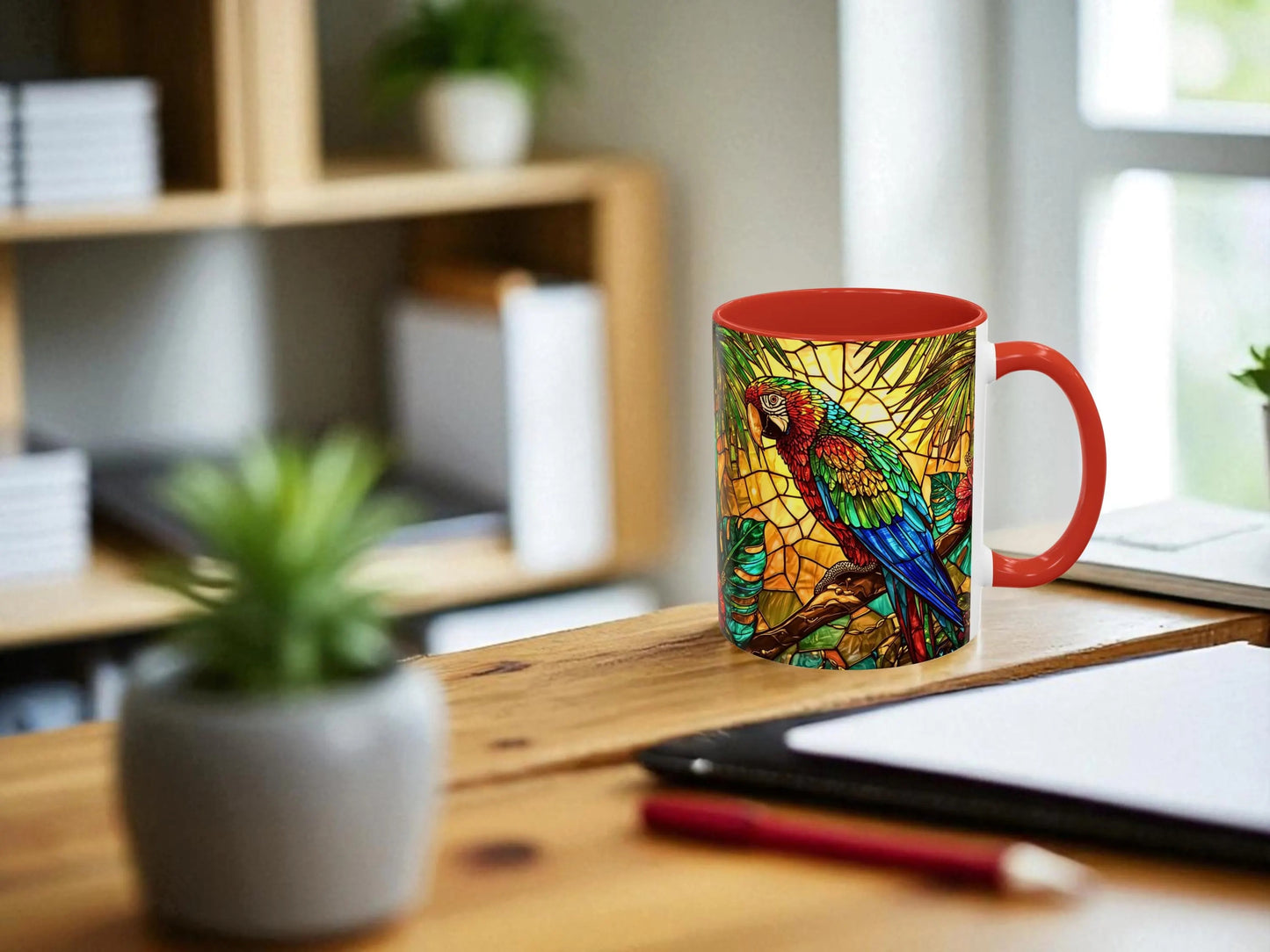 Colorful parrot mug on a desk with a blurred office background
