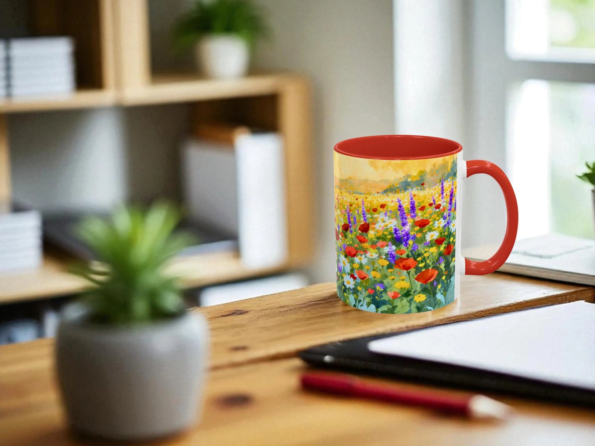 Mug with floral design on a desk in a home office setting