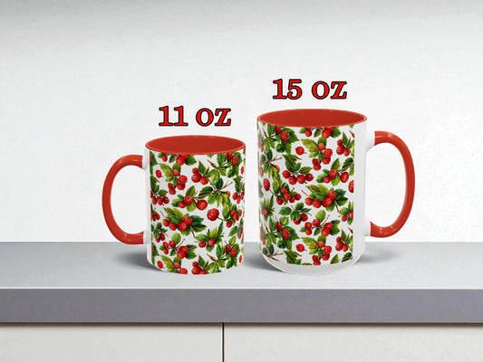 Two mugs with red interior and floral pattern on a white surface, labeled 11 oz and 15 oz.