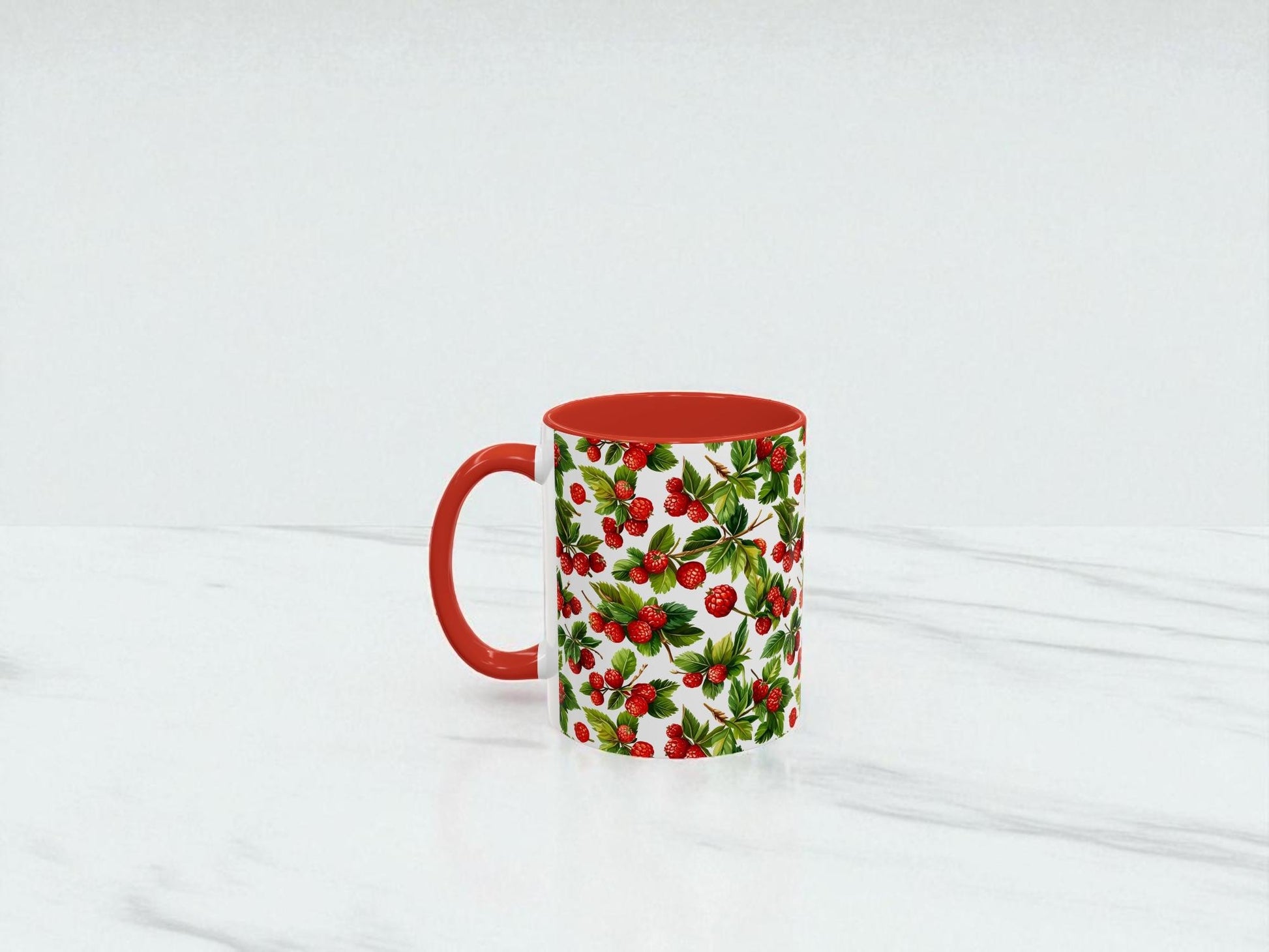 Mug with red interior and floral pattern on a white background