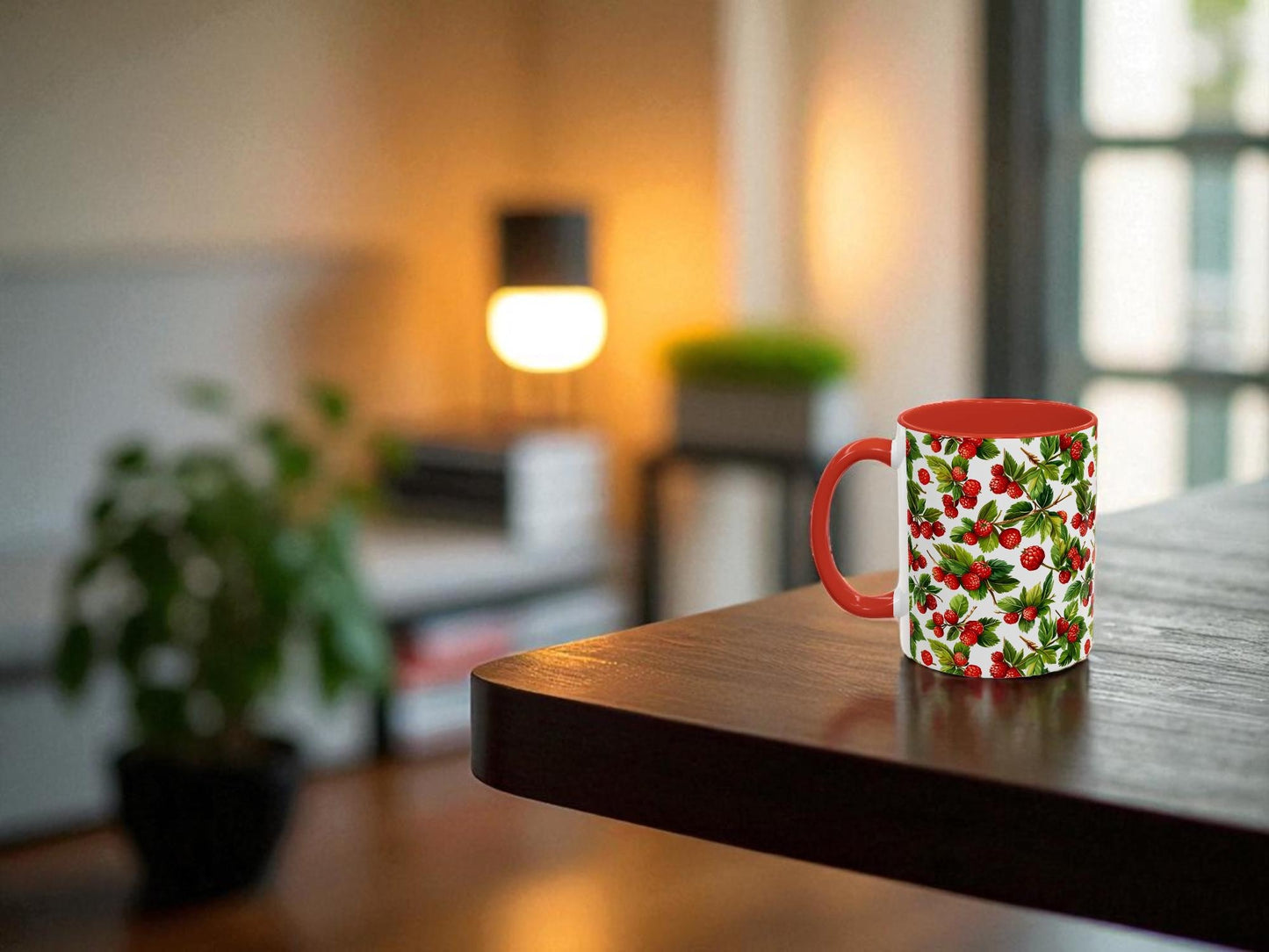 Colorful mug with a floral pattern on a wooden table in a softly blurred room setting.