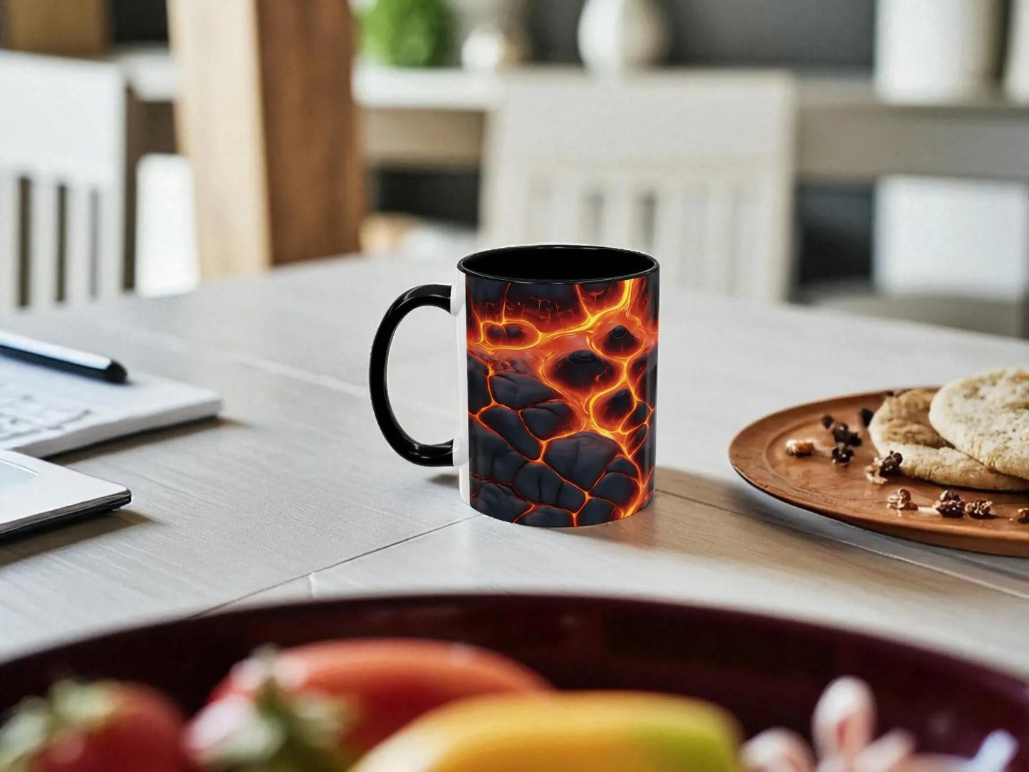 Mug with lava design on a table with fruit and a plate in a kitchen setting