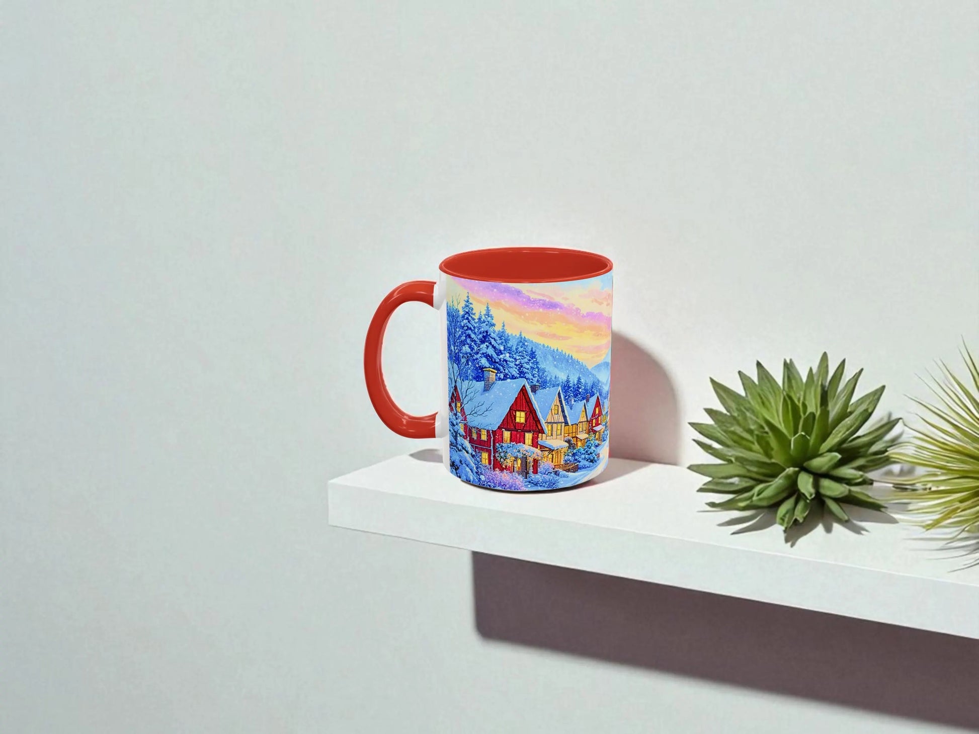 Mug with a scenic design on a white surface with a plant