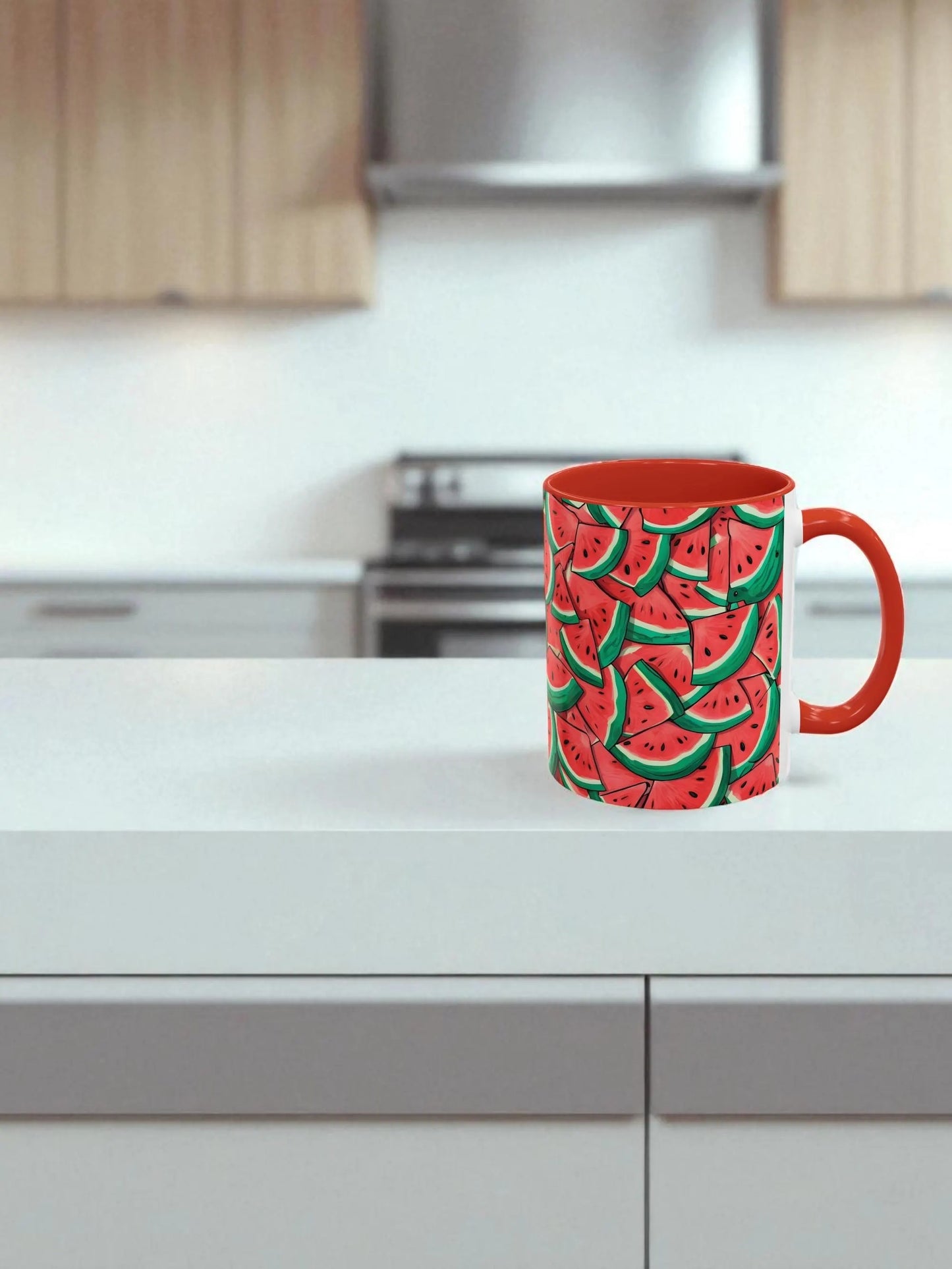 Red mug with watermelon pattern on a kitchen counter