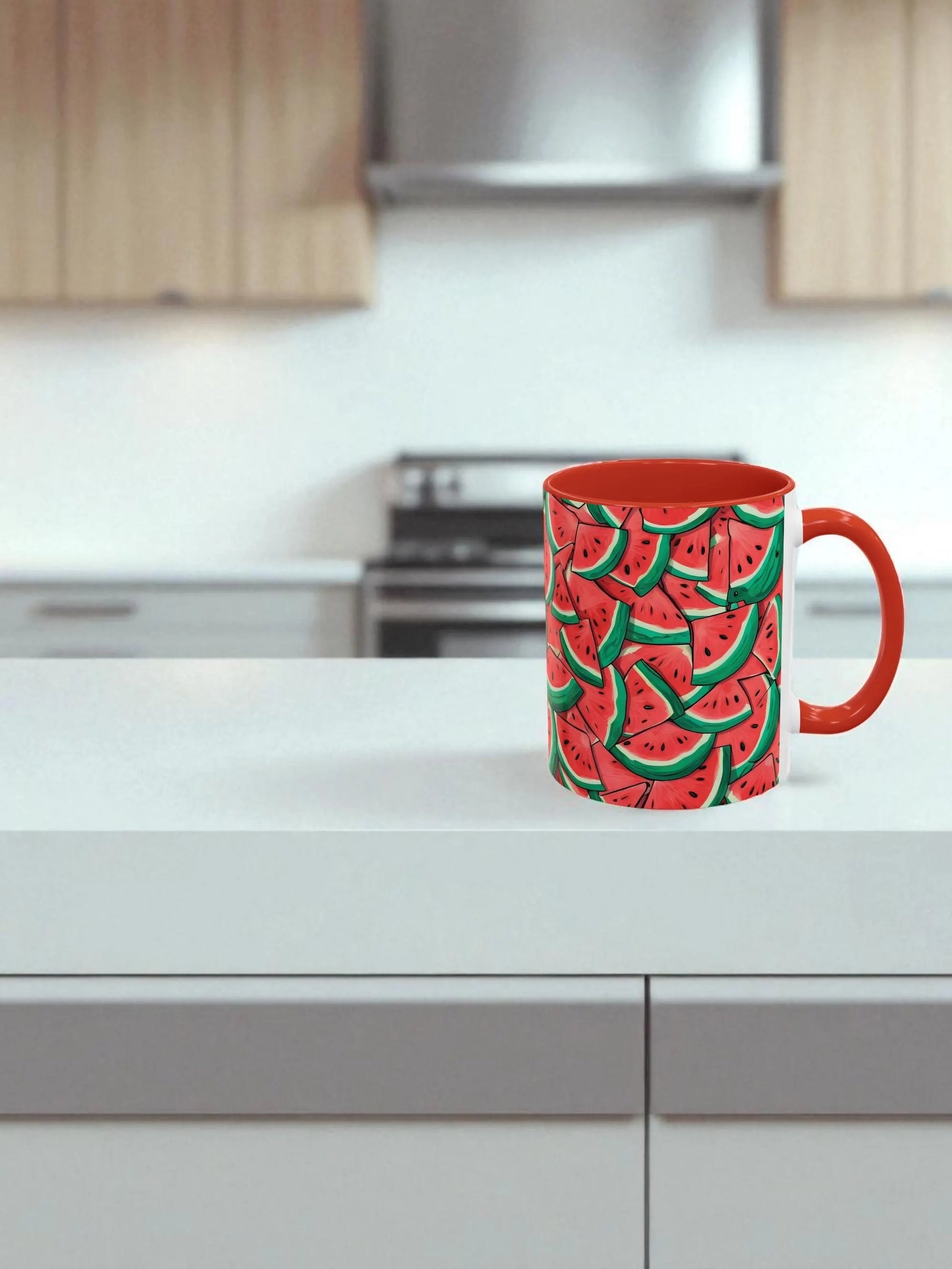 Red mug with watermelon pattern on a kitchen counter