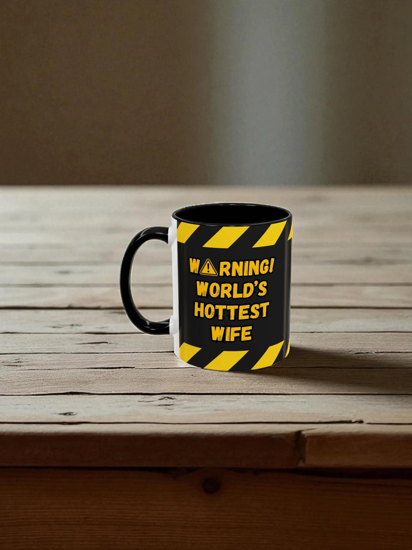 Mug with 'Warning! World's Hottest Wife' text on a wooden surface