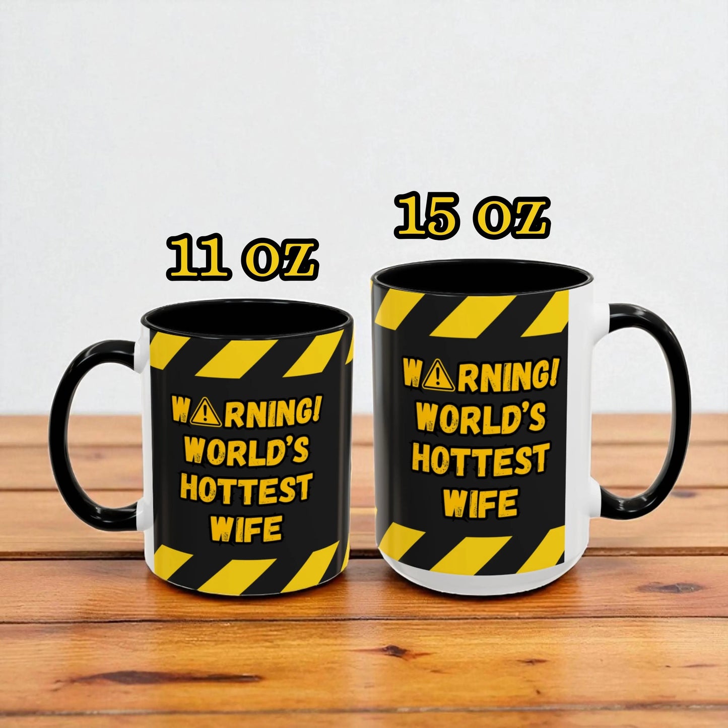 Two mugs with warning labels on a wooden surface