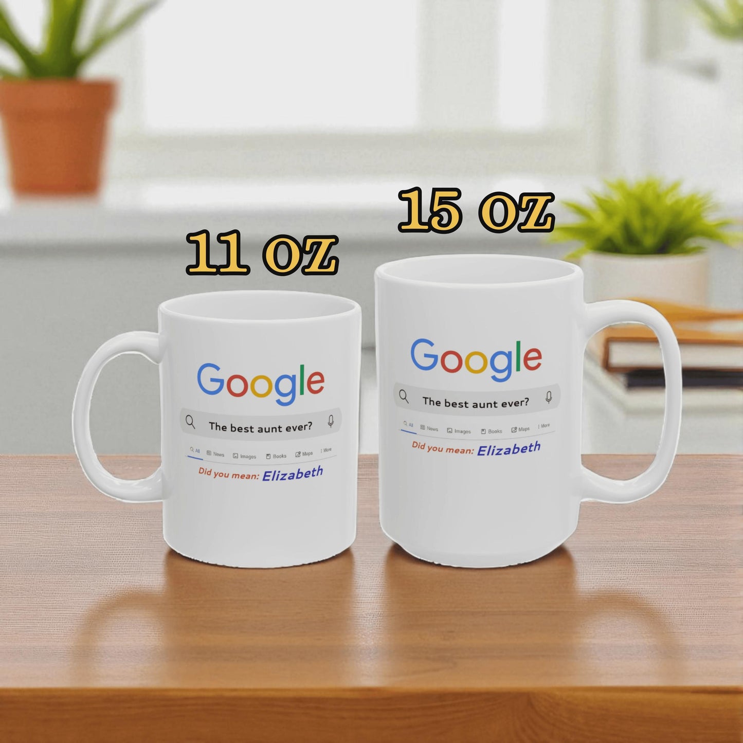 Two white mugs with Google logo and text on a wooden surface, labeled 11 oz and 15 oz.