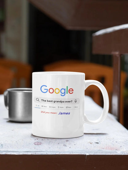 White mug with Google search interface design on a table