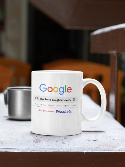 White mug with Google search interface design on a table