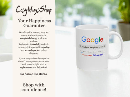 White mug with colorful text on a white surface with a blurred background