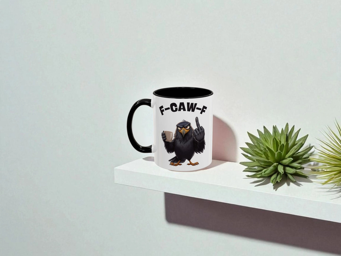 Mug with an eagle design and text on a white shelf with a plant
