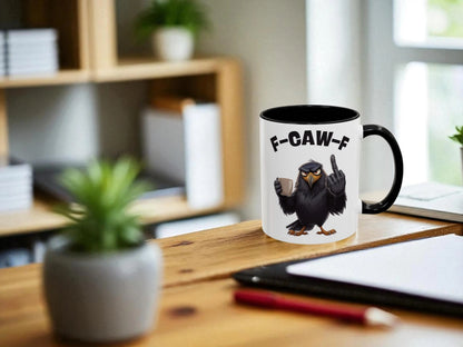 Mug with a bird design and text on a desk with office items