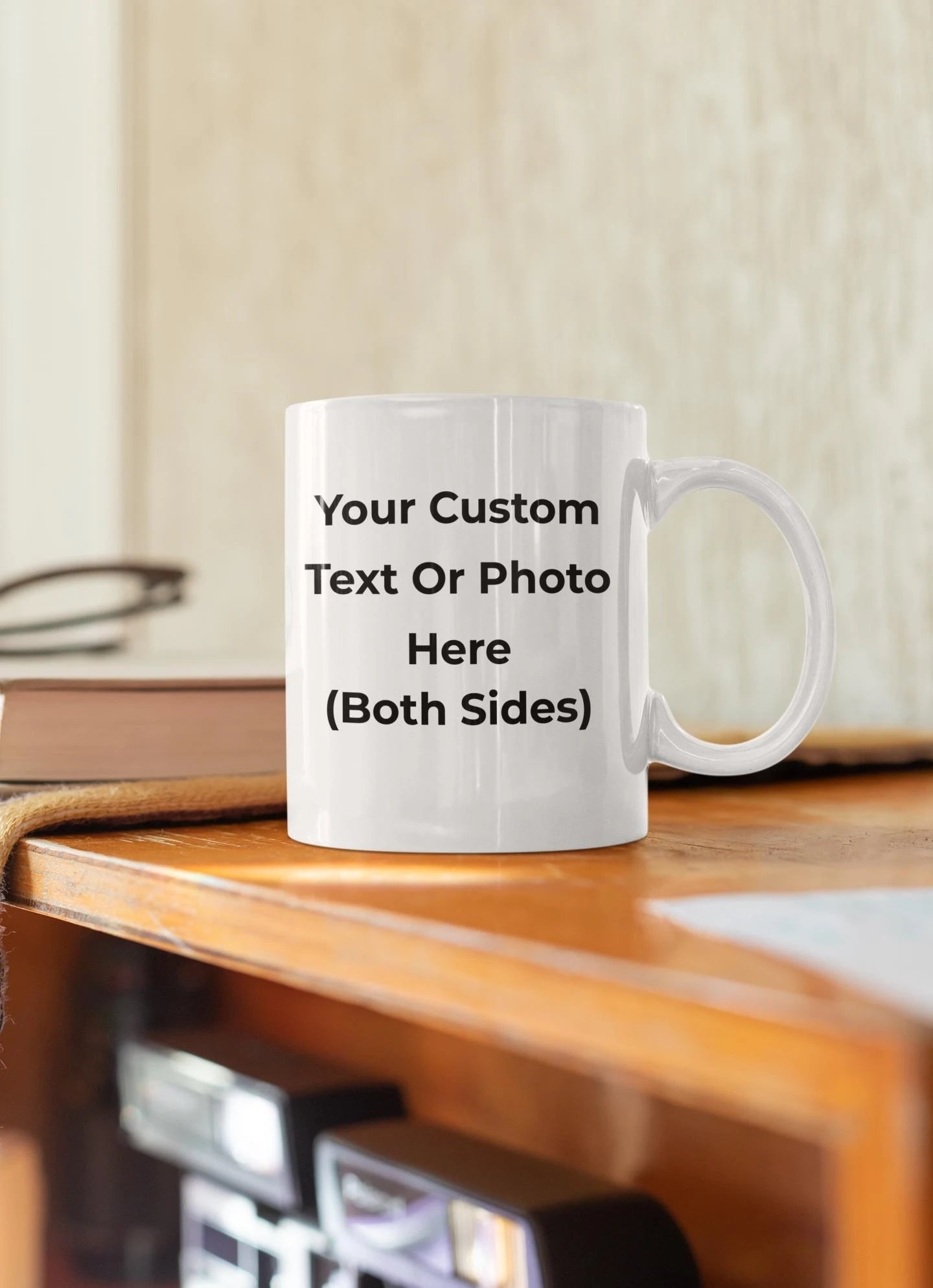 White mug with customizable text or photo on a wooden surface