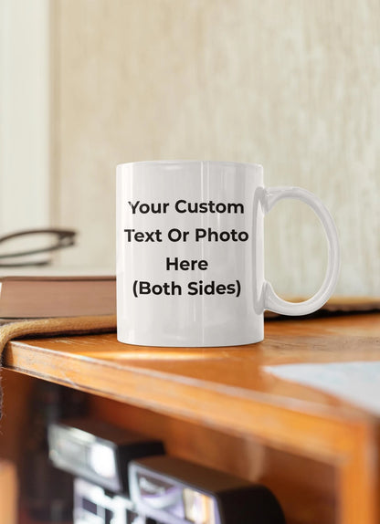 White mug with customizable text or photo on a wooden surface
