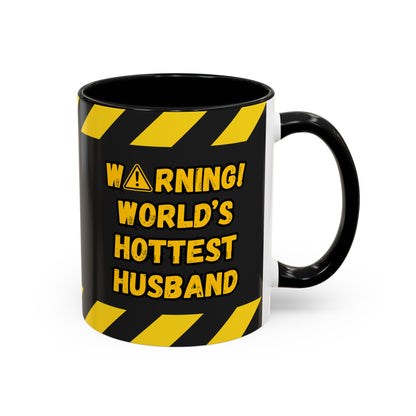 Black mug with yellow warning text on a white background